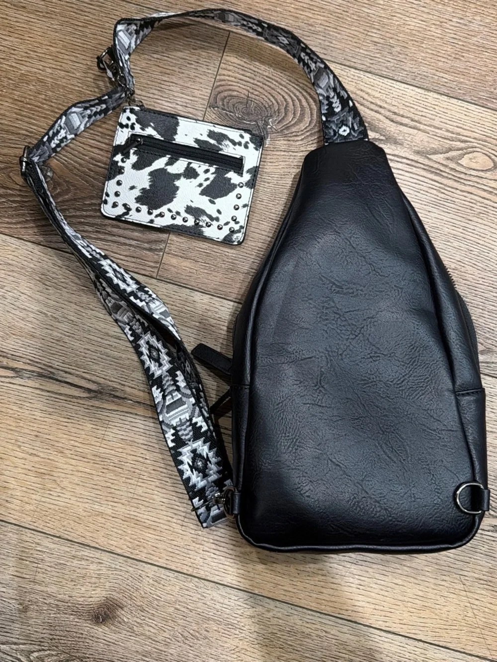 Black & White Cowhide Crossbody Sling Bag with Concho Accent